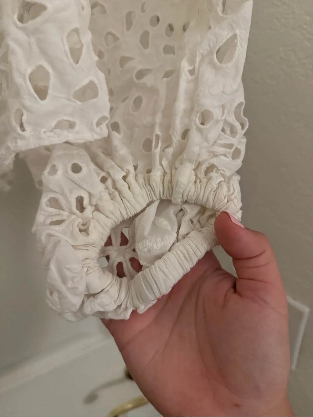 Zara button cutout